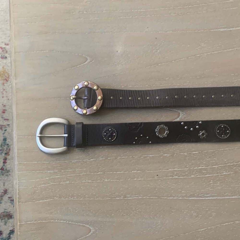 2 leather belts, one brown one black